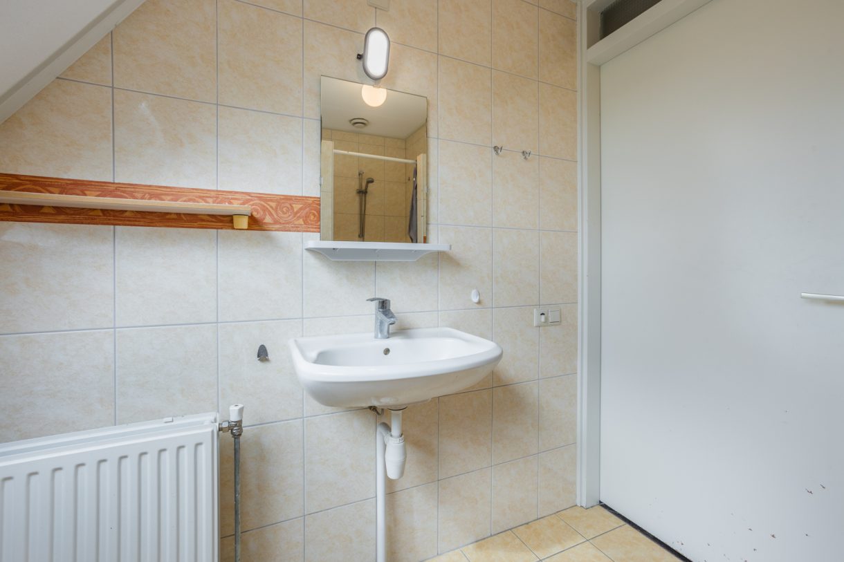 Te koop: Foto Woonhuis aan de Warmenbossenweg 3-16 in Schoonloo